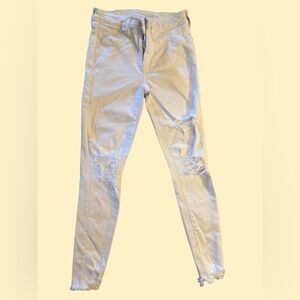 American Eagle Outfitters white distressed NEXT LEVEL STRETCH Jegging size 2